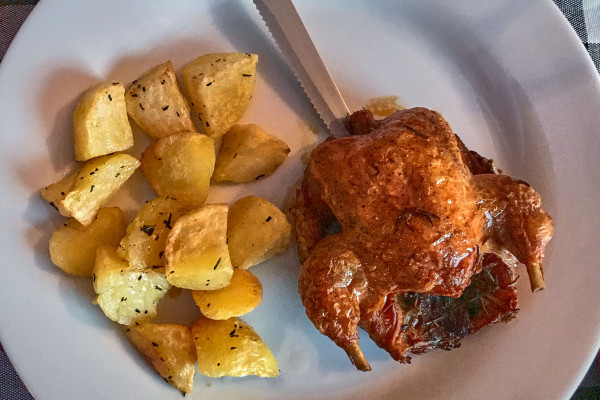Grilled chicken with potatoes offered from Le Tre Trerrazze