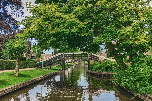 Wooden bridges over the water canals in Giethoorn Village