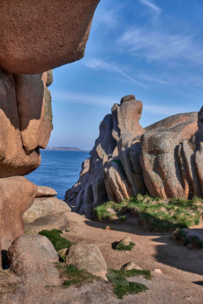 Walking path into the rocks at Ploumanac’h on the Pink Granite Coast in Brittany, France