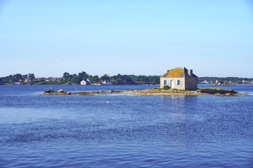 Little cottage with blue shutters (Nichtarguer) next to Saint-Cado Islet, BRittany France