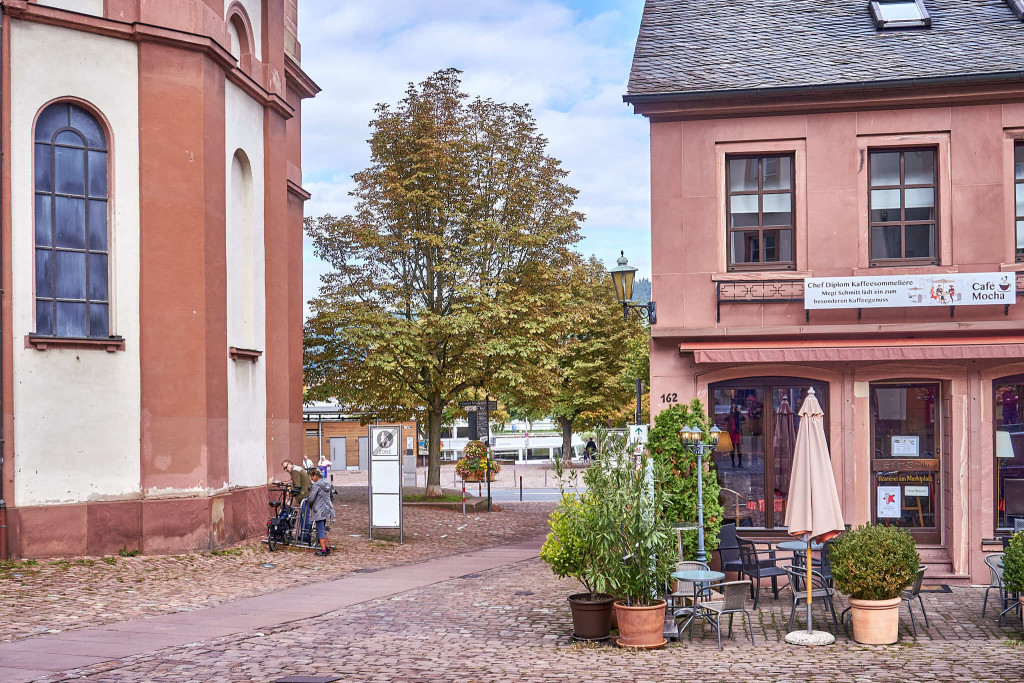 Walkway to the riverside next to the St. Jakobus church; pretty town Miltenberg in Bavaria